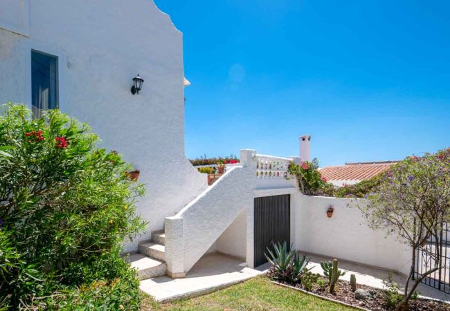 Casa adosada en Nerja - Adosado con terrazas, jardín y piscina comunitaria Casa adosada en Nerja - Adosado con terrazas, jardín y piscina comunitaria